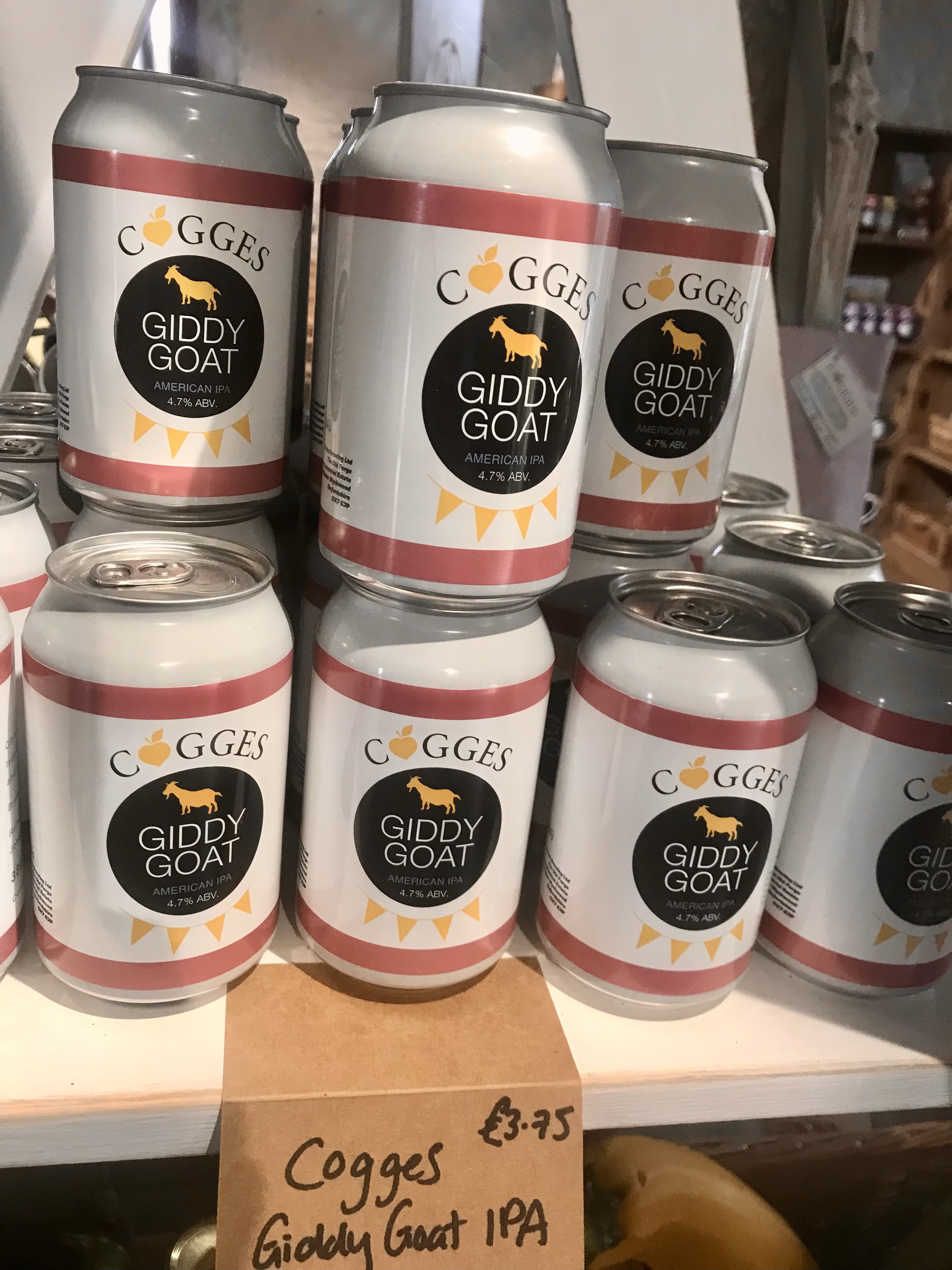 Cogges Giddy Goat cans of IPA stacked in the shop